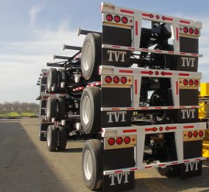 Three sets of onion trailers stacked on top of each other
