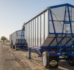 Blue trailers on a road